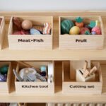 Wooden magnetic vegetable and fruit slicer set, wooden box set, wooden cutting board and cookware combination.